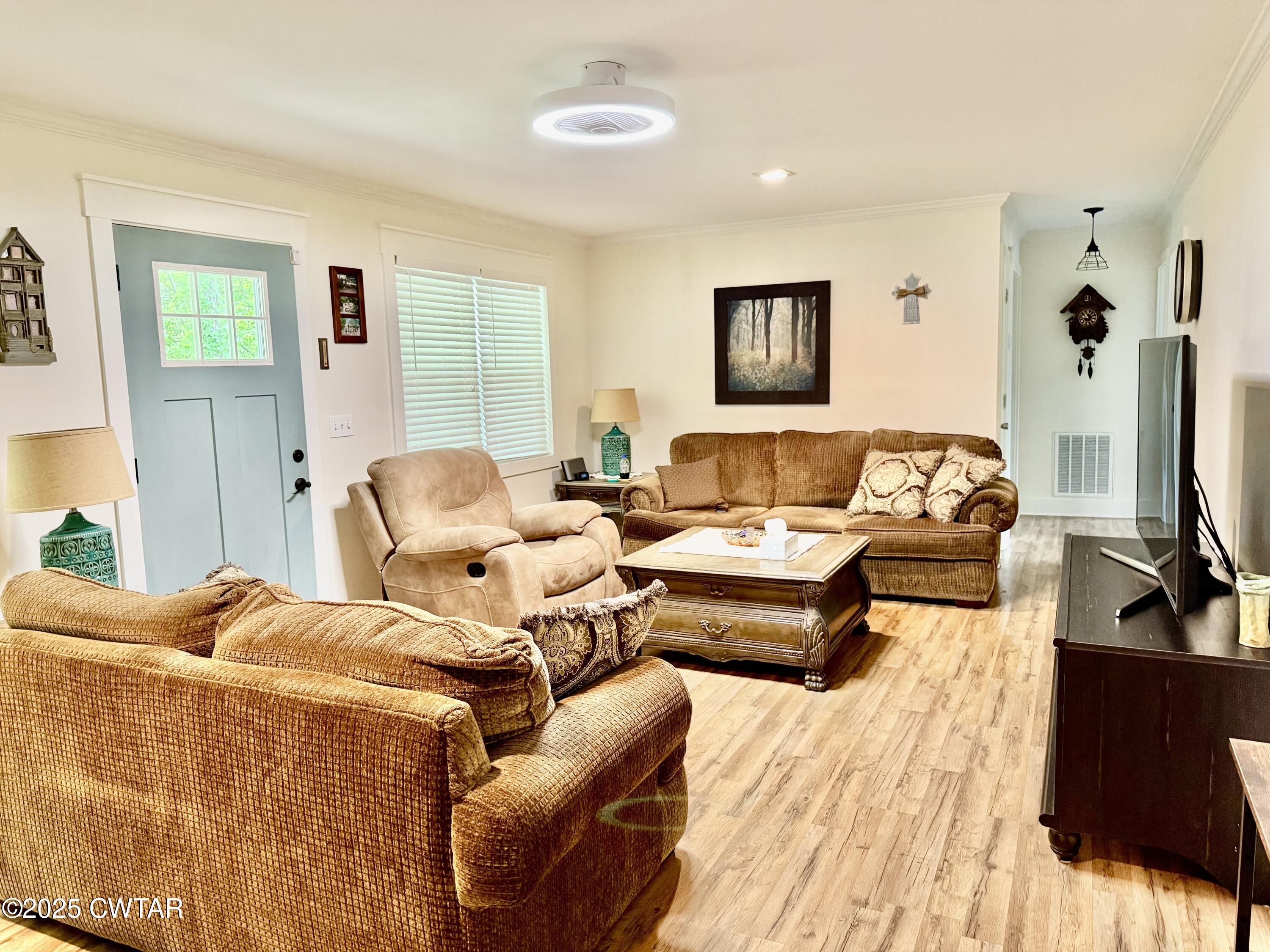 0 Webb Store Road Hornbeak, TN 38232 - Photo 4 of 22 a bedroom with furniture and wooden floor