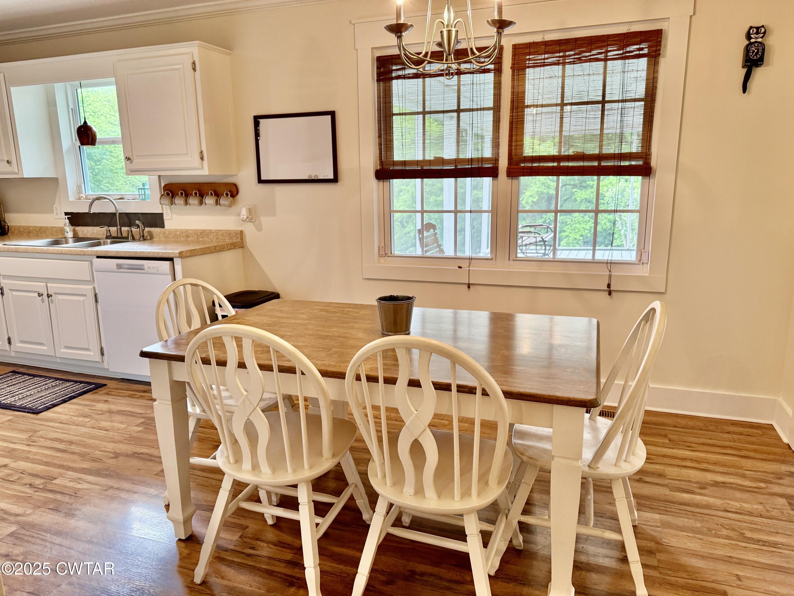 0 Webb Store Road Hornbeak, TN 38232 - Photo 10 of 22 a view of a dining room with furniture and window