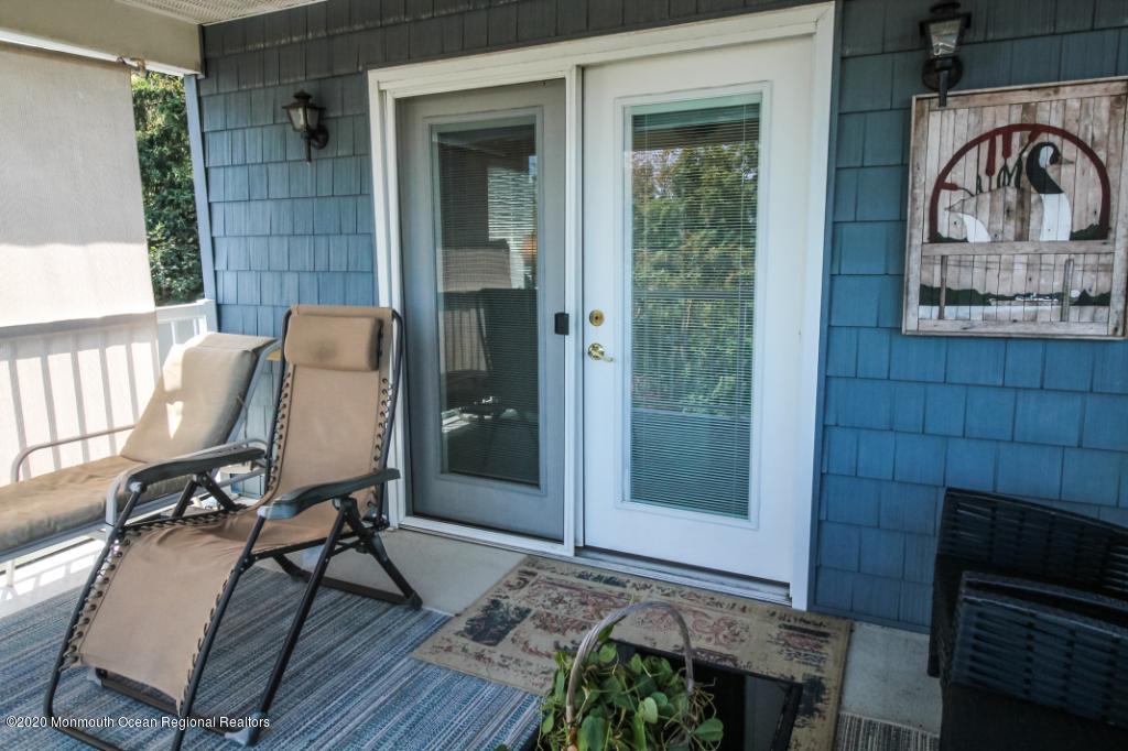 43 Portland Road Highlands, NJ 07732 - Photo 37 of 47 a view of a balcony with chair and front door