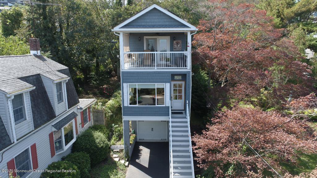 43 Portland Road Highlands, NJ 07732 - Photo 44 of 47 a front view of a house with a garden