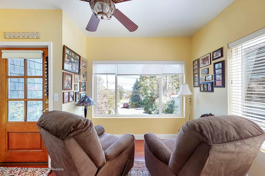 43 Portland Road Highlands, NJ 07732 - Photo 7 of 47 a living room with furniture and a large window