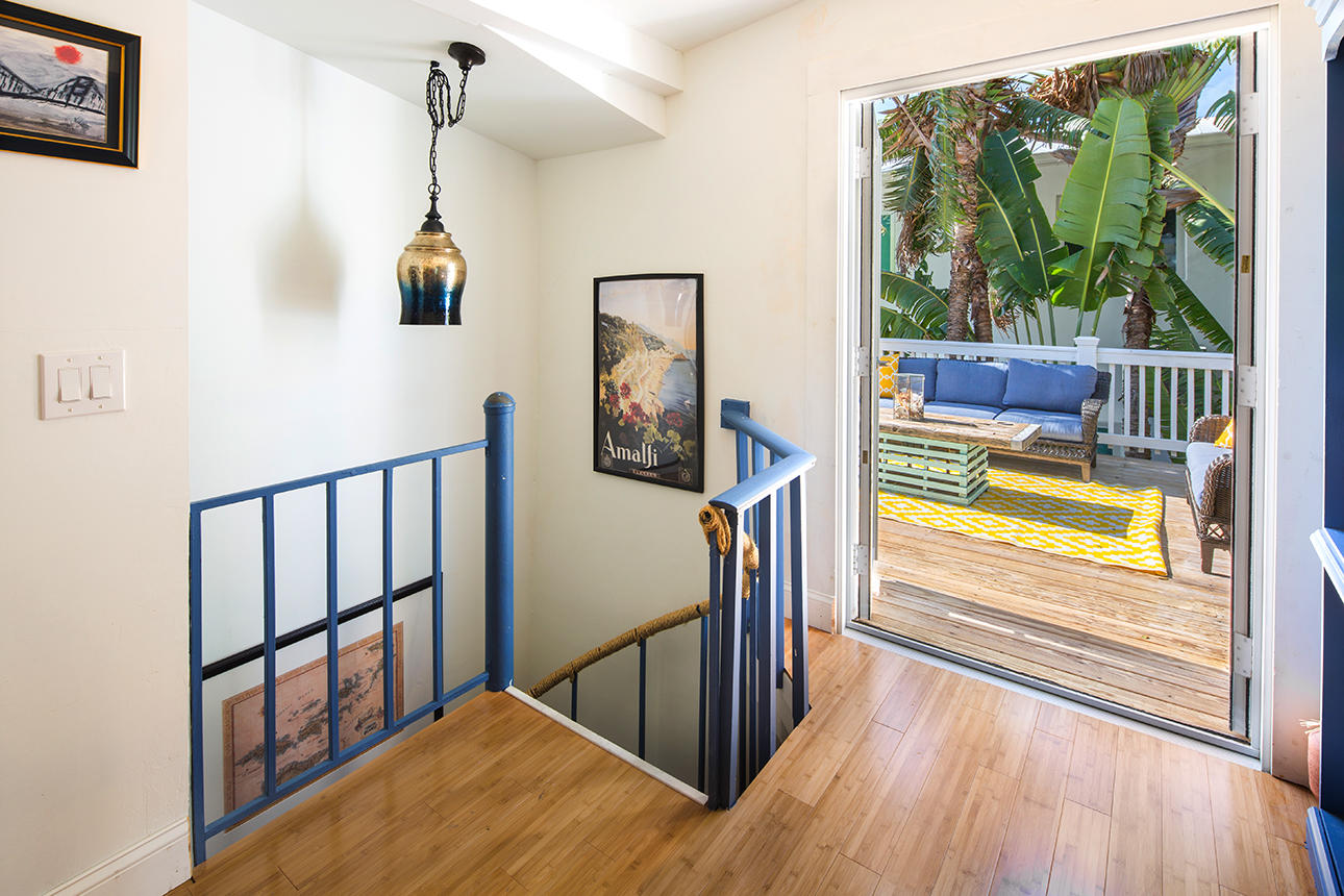 1425 Laird Street Key West, FL 33040 - Photo 17 of 26 a view of a balcony with wooden floor