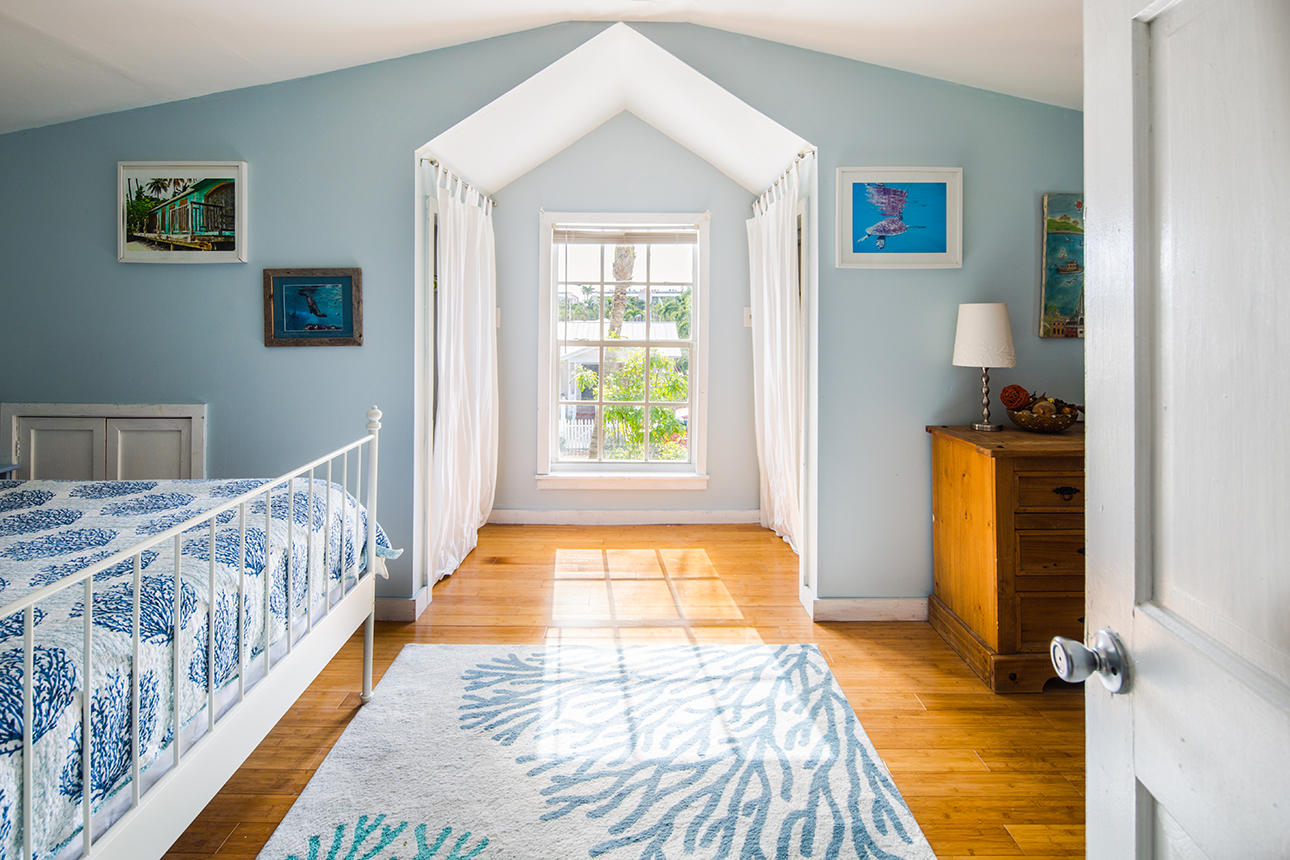 1425 Laird Street Key West, FL 33040 - Photo 20 of 26 a view of bedroom with wooden floor