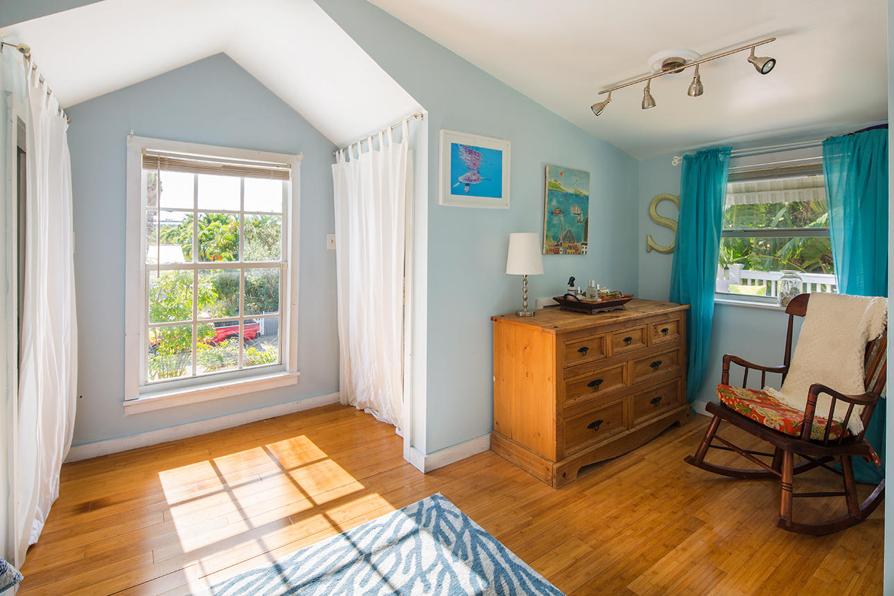 1425 Laird Street Key West, FL 33040 - Photo 21 of 26 a room with furniture and windows