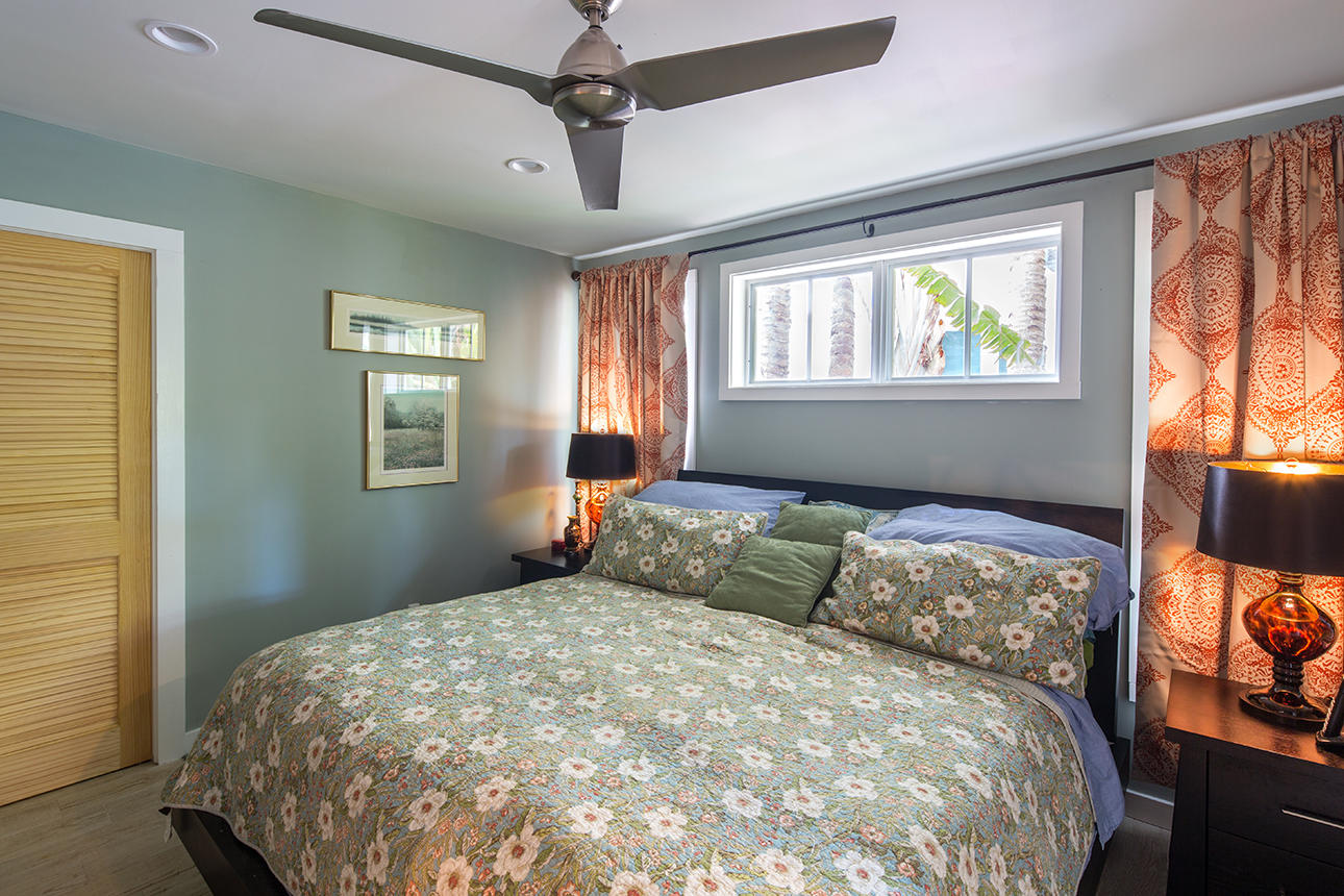 1425 Laird Street Key West, FL 33040 - Photo 25 of 26 a bedroom with a bed and window