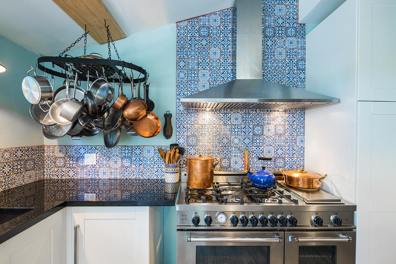 1425 Laird Street Key West, FL 33040 - Photo 6 of 26 a stove top oven sitting inside of a kitchen