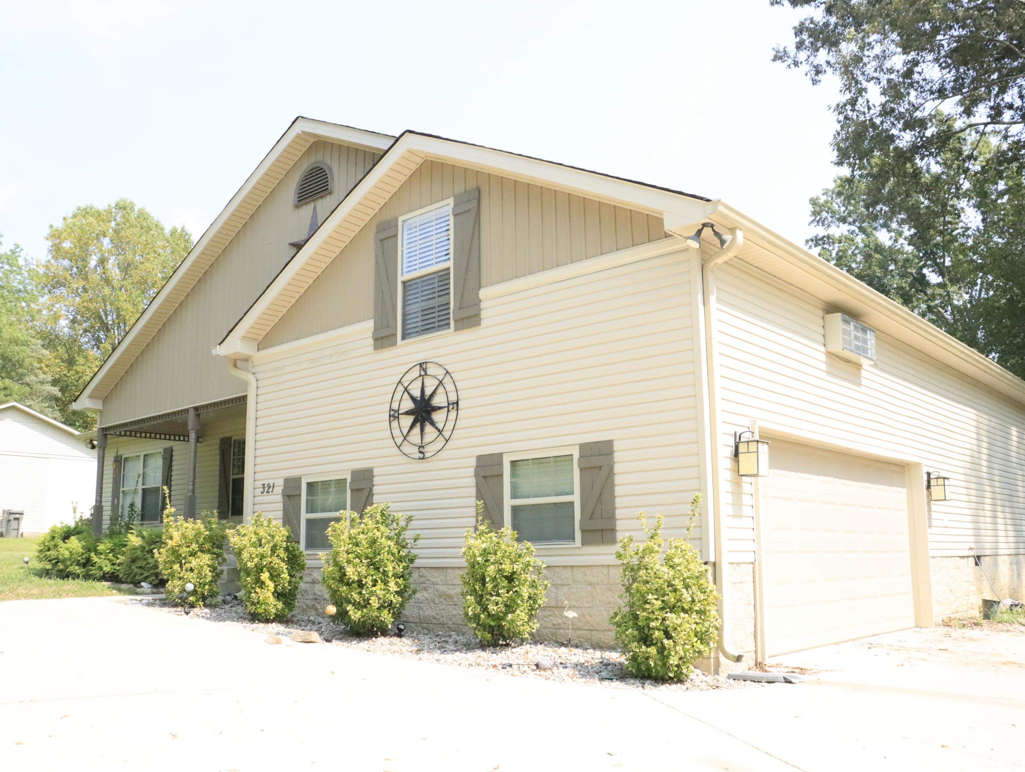 321 South Leath Road Portland, TN 37148 - Photo 3 of 33 a front view of a house with a yard