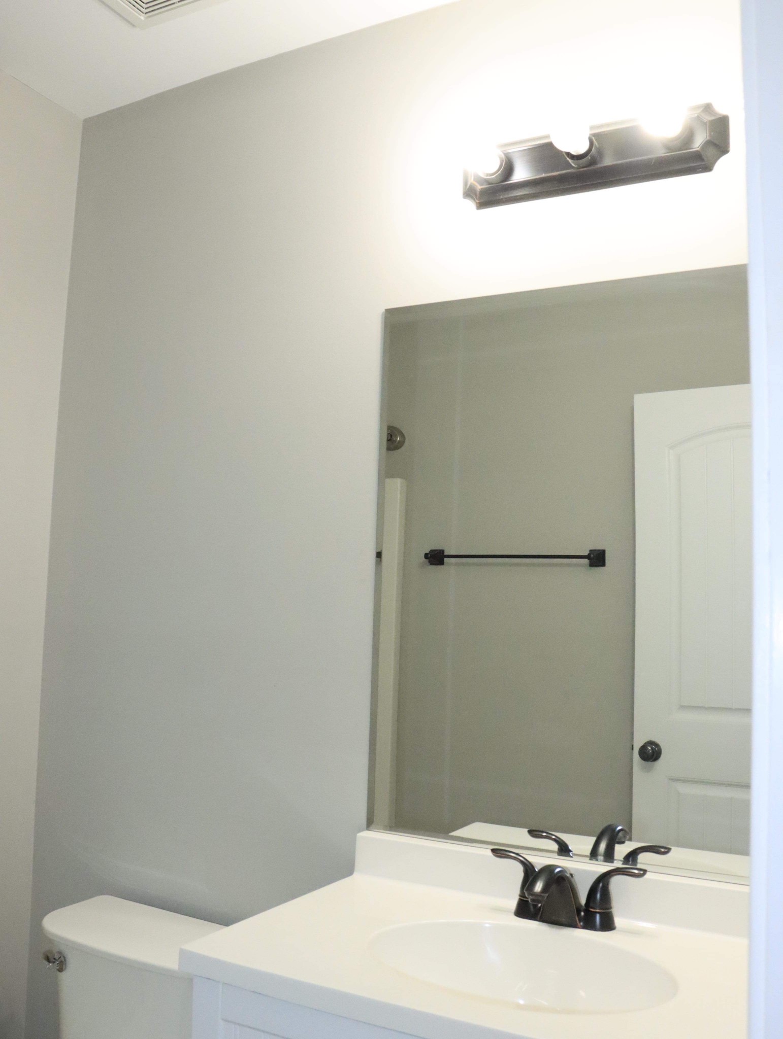 321 South Leath Road Portland, TN 37148 - Photo 22 of 33 a bathroom with a sink and a mirror
