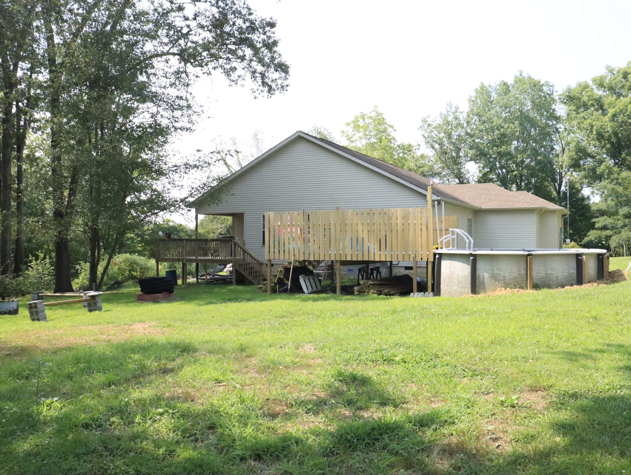 321 South Leath Road Portland, TN 37148 - Photo 5 of 33 a view of a house with a yard and large trees