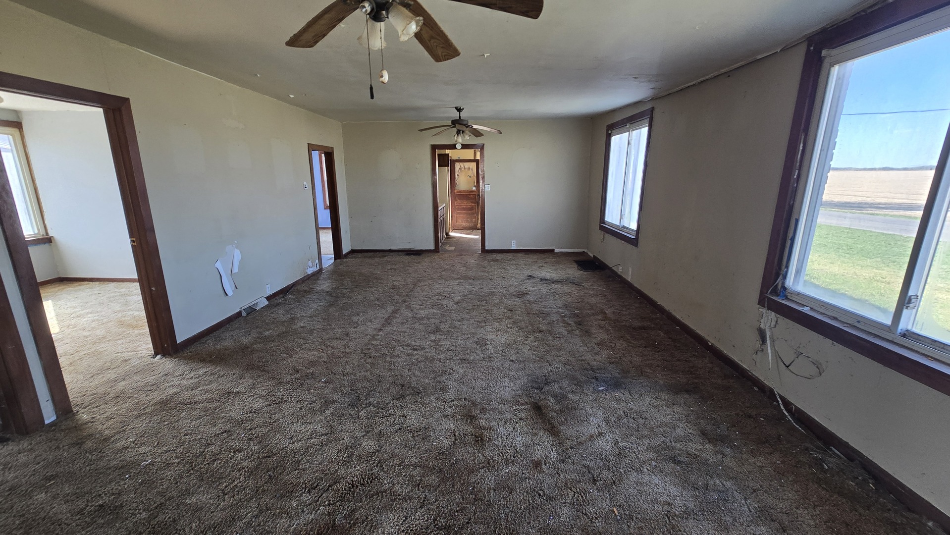 4710 Section Street Streator, IL 61364 - Photo 12 of 19 wooden floor in an empty room with a window