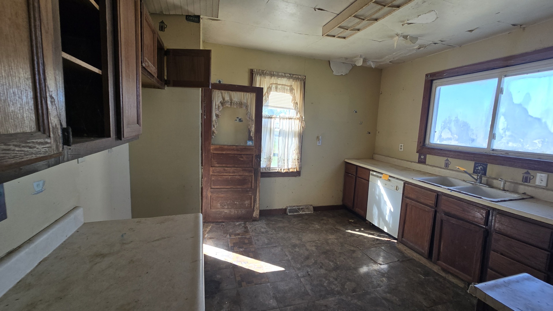4710 Section Street Streator, IL 61364 - Photo 17 of 19 a view of a kitchen with a sink and a window