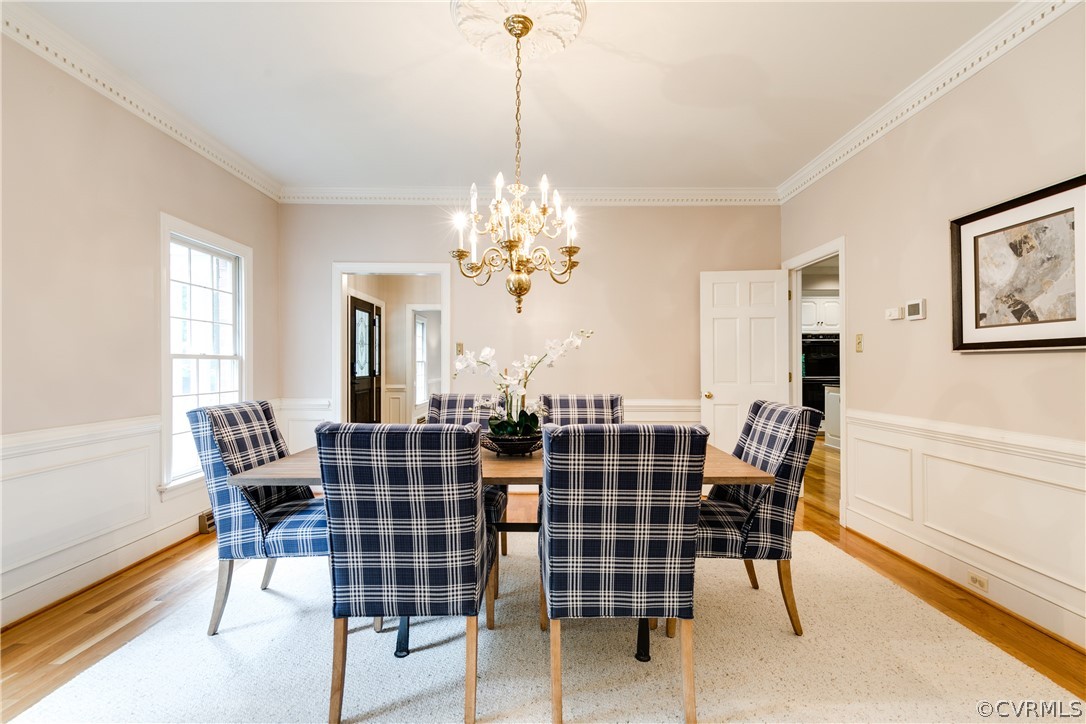 3830 Reeds Landing Circle Midlothian, VA 23113 - Photo 21 of 50 a dining room with furniture a chandelier and window