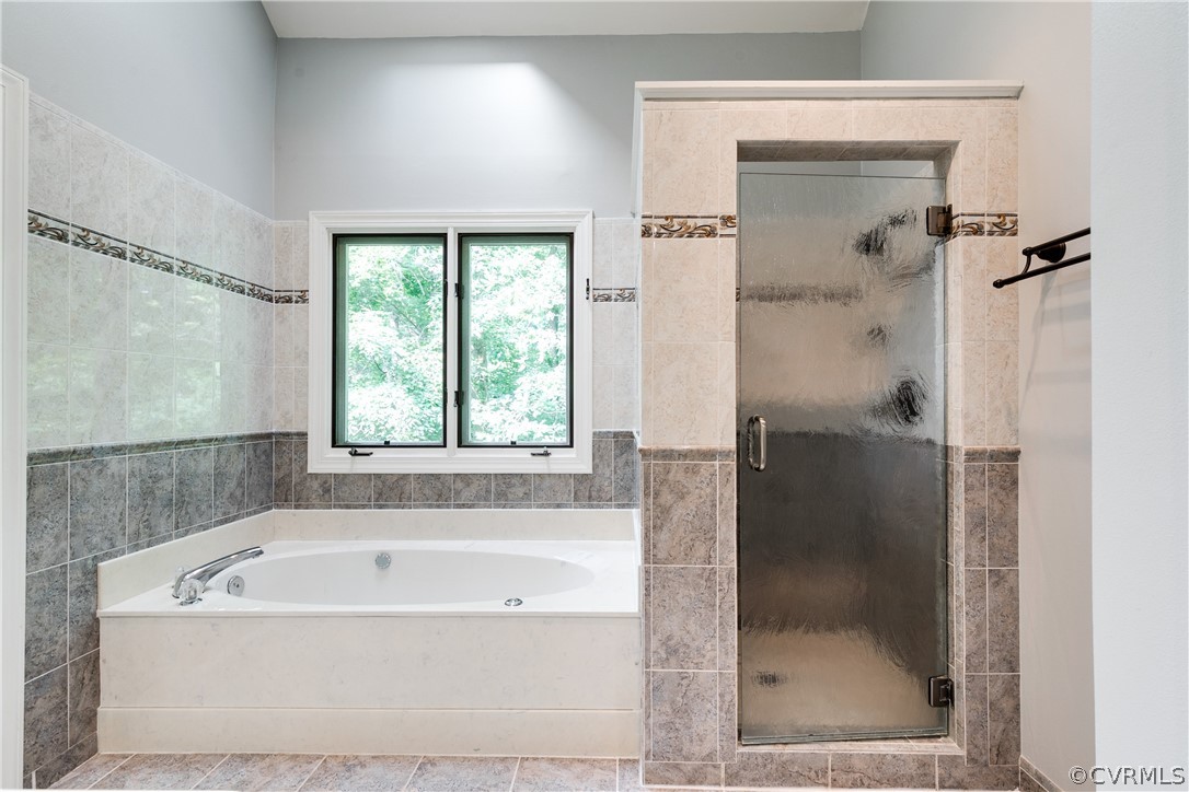3830 Reeds Landing Circle Midlothian, VA 23113 - Photo 36 of 50 a bathroom with a bathtub and shower