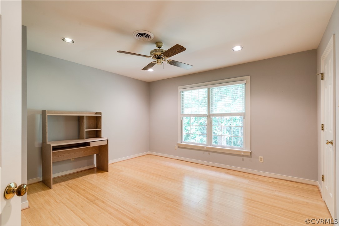 3830 Reeds Landing Circle Midlothian, VA 23113 - Photo 40 of 50 a view of an empty room with a window and a kitchen