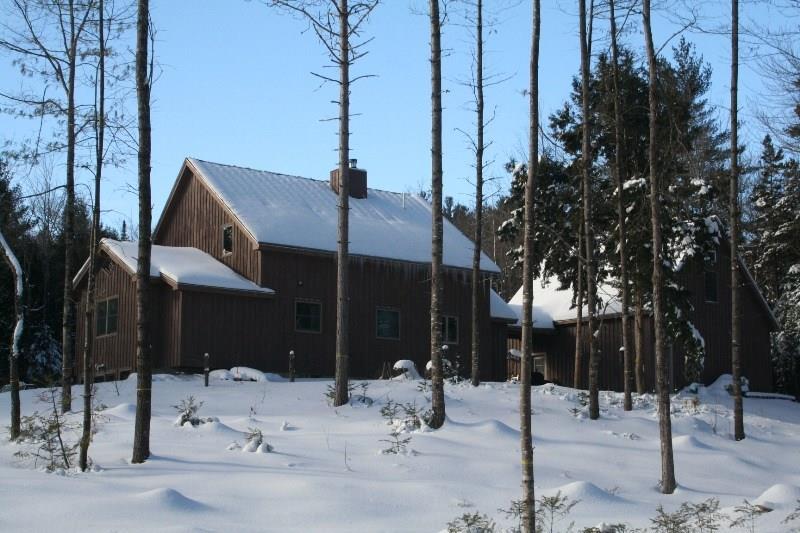 176 Baker Road Bethel, ME 04217 - Photo 28 of 29 Exterior back of home in winter