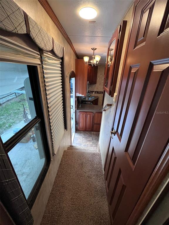 3000 Clarcona Road, Unit 343 Apopka, FL 32703 - Photo 15 of 15 a view of kitchen and utility room