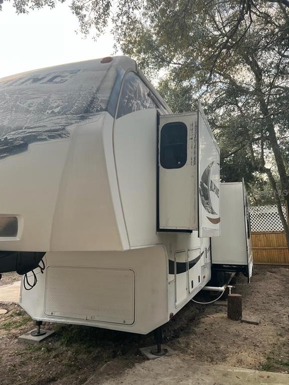 3000 Clarcona Road, Unit 343 Apopka, FL 32703 - Photo 2 of 15 a view of roof and microwave
