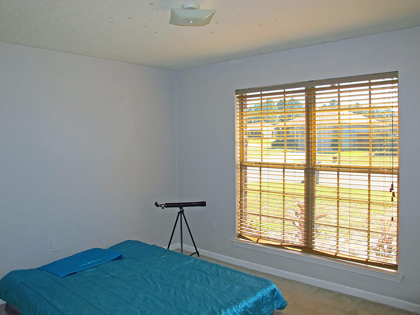 7980 Promise Creek Road Navarre, FL 32566 - Photo 20 of 31 a view of a livingroom with a window