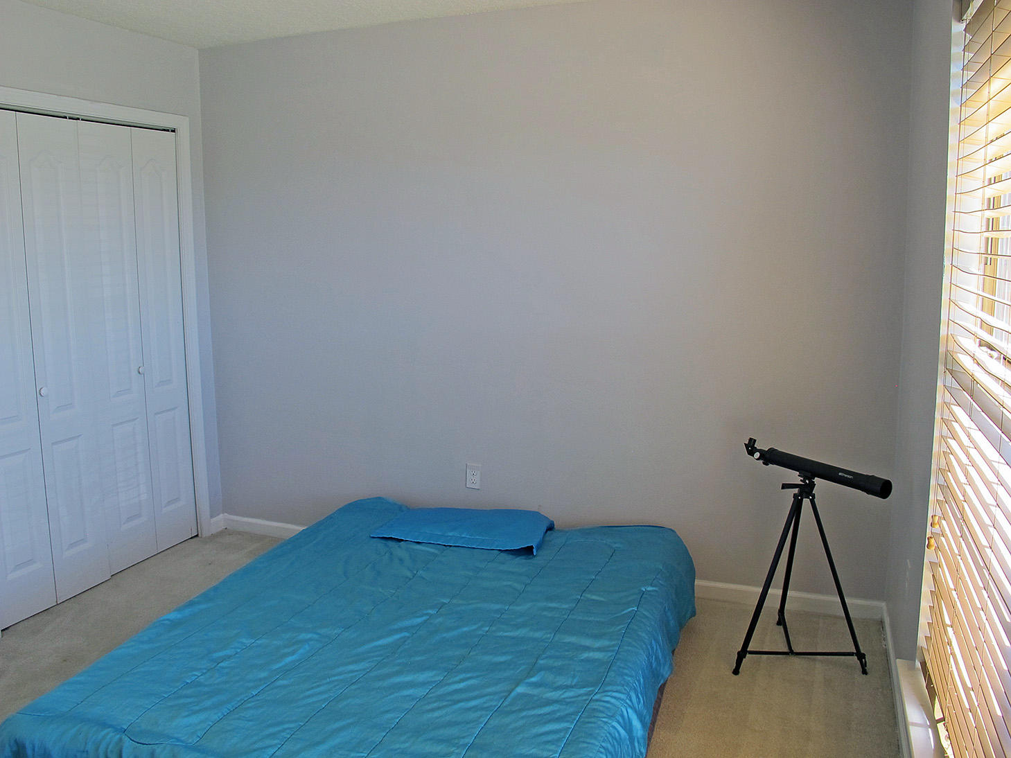 7980 Promise Creek Road Navarre, FL 32566 - Photo 21 of 31 a room with a bed and a window