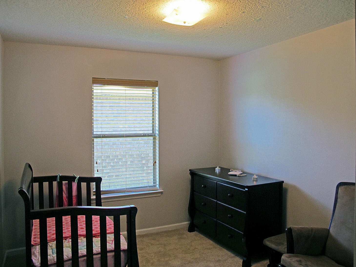 7980 Promise Creek Road Navarre, FL 32566 - Photo 22 of 31 a view of a workspace with furniture and a window