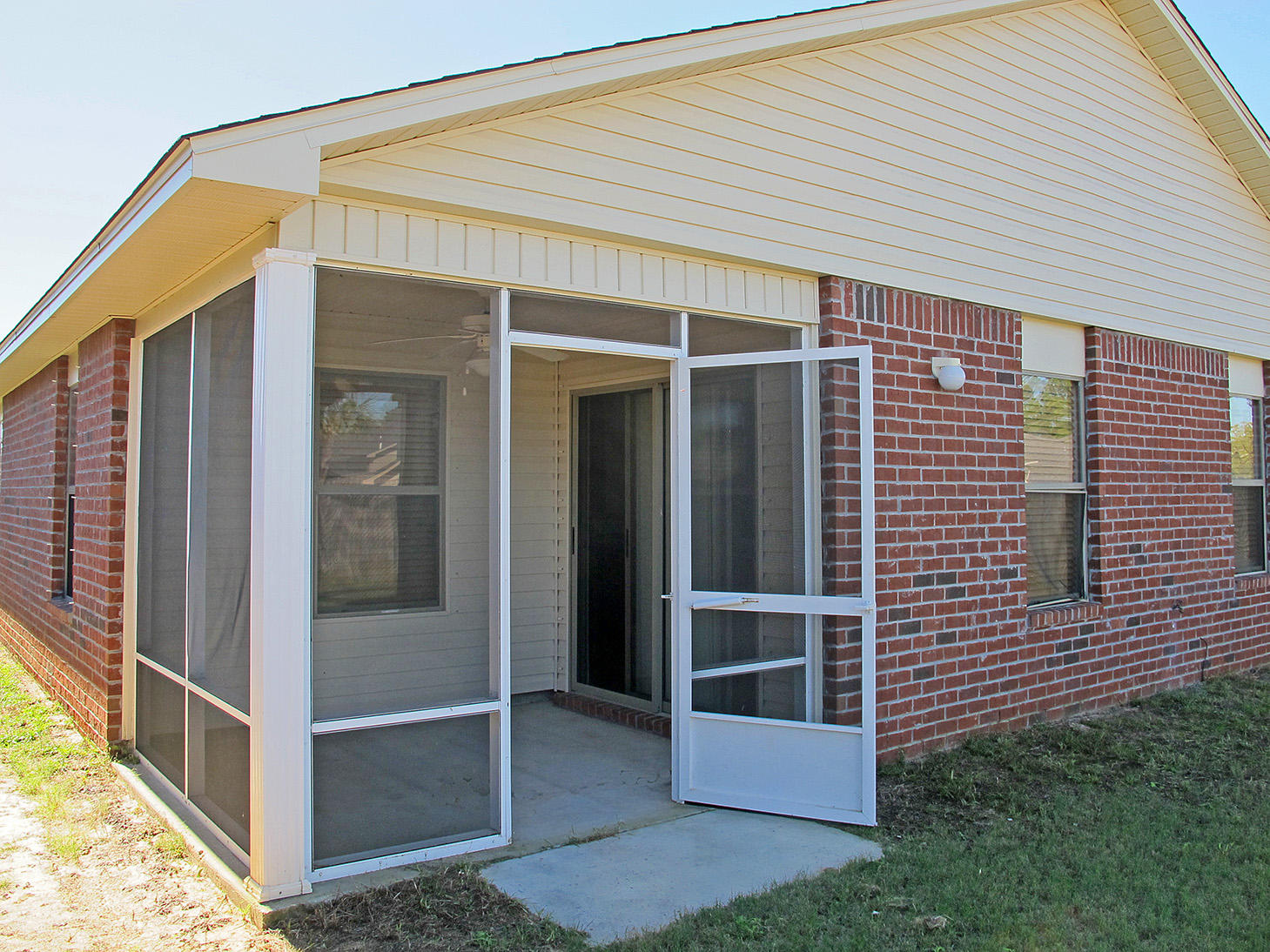 7980 Promise Creek Road Navarre, FL 32566 - Photo 25 of 31 a front view of a house with plants