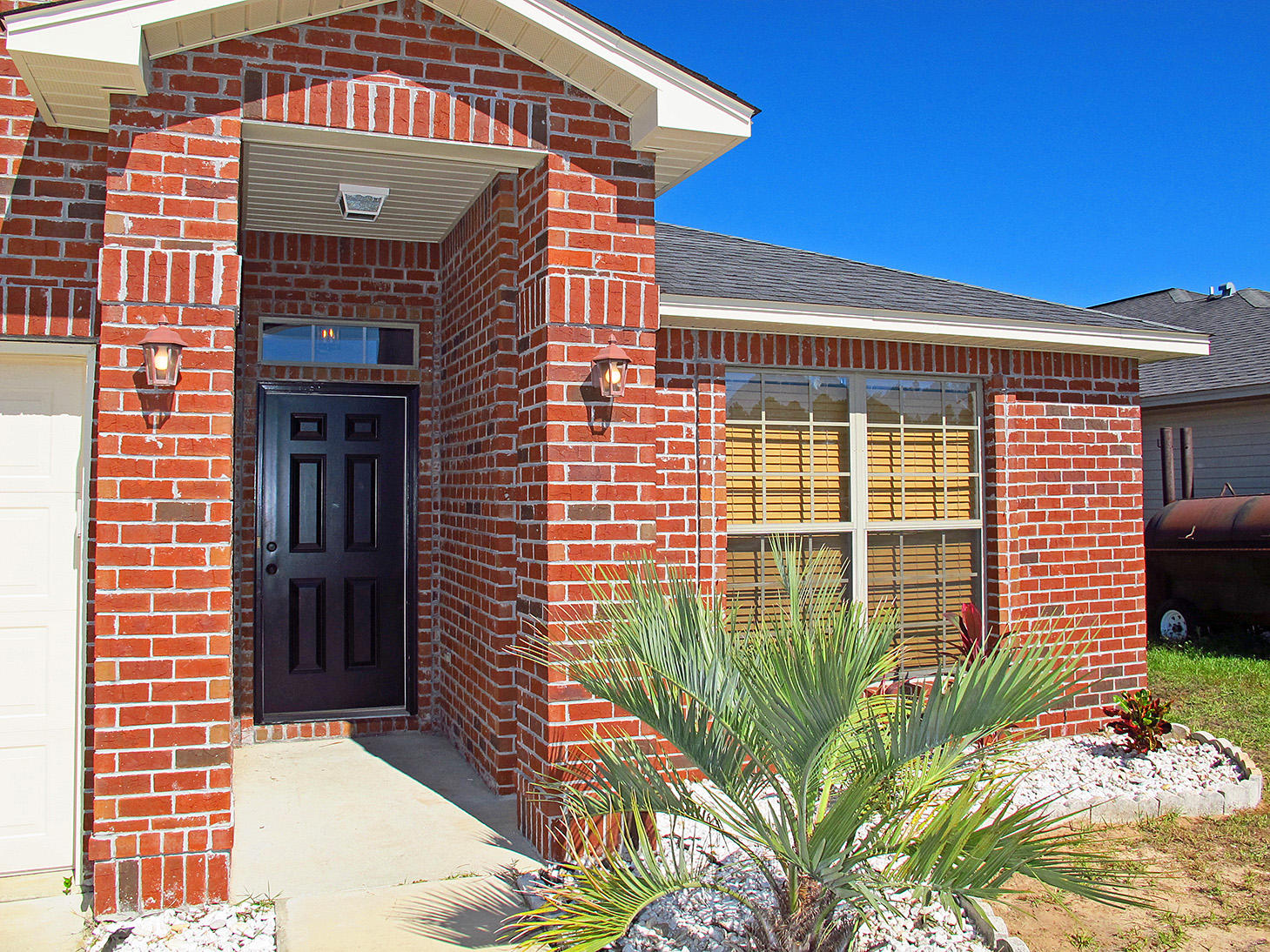 7980 Promise Creek Road Navarre, FL 32566 - Photo 4 of 31 a front view of a house