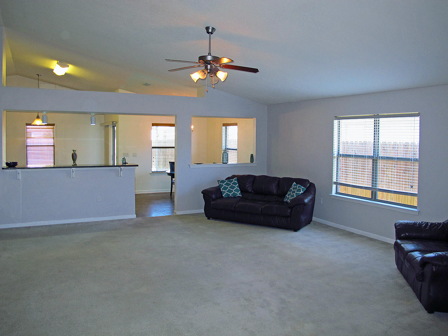 7980 Promise Creek Road Navarre, FL 32566 - Photo 8 of 31 a living room with furniture and a large window