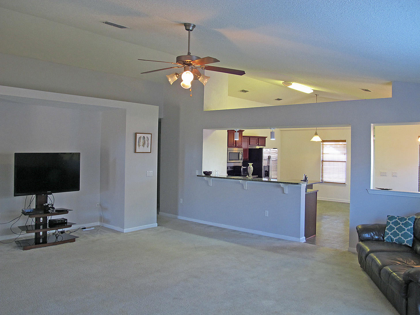 7980 Promise Creek Road Navarre, FL 32566 - Photo 9 of 31 a view of a livingroom with furniture