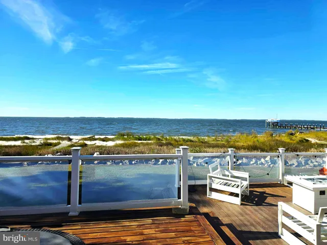 a view of an ocean and city