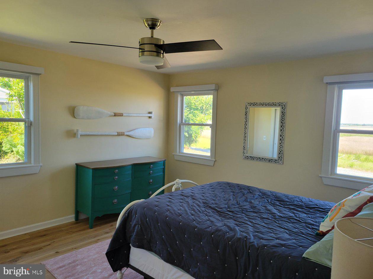 8034 Riverview Road Westover, MD 21871 - Photo 34 of 47 a bedroom with a bed and a window