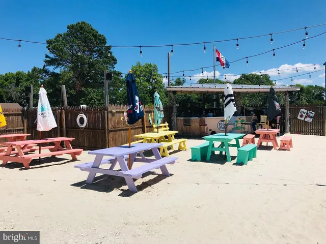 a view of a chairs and tables in the patio