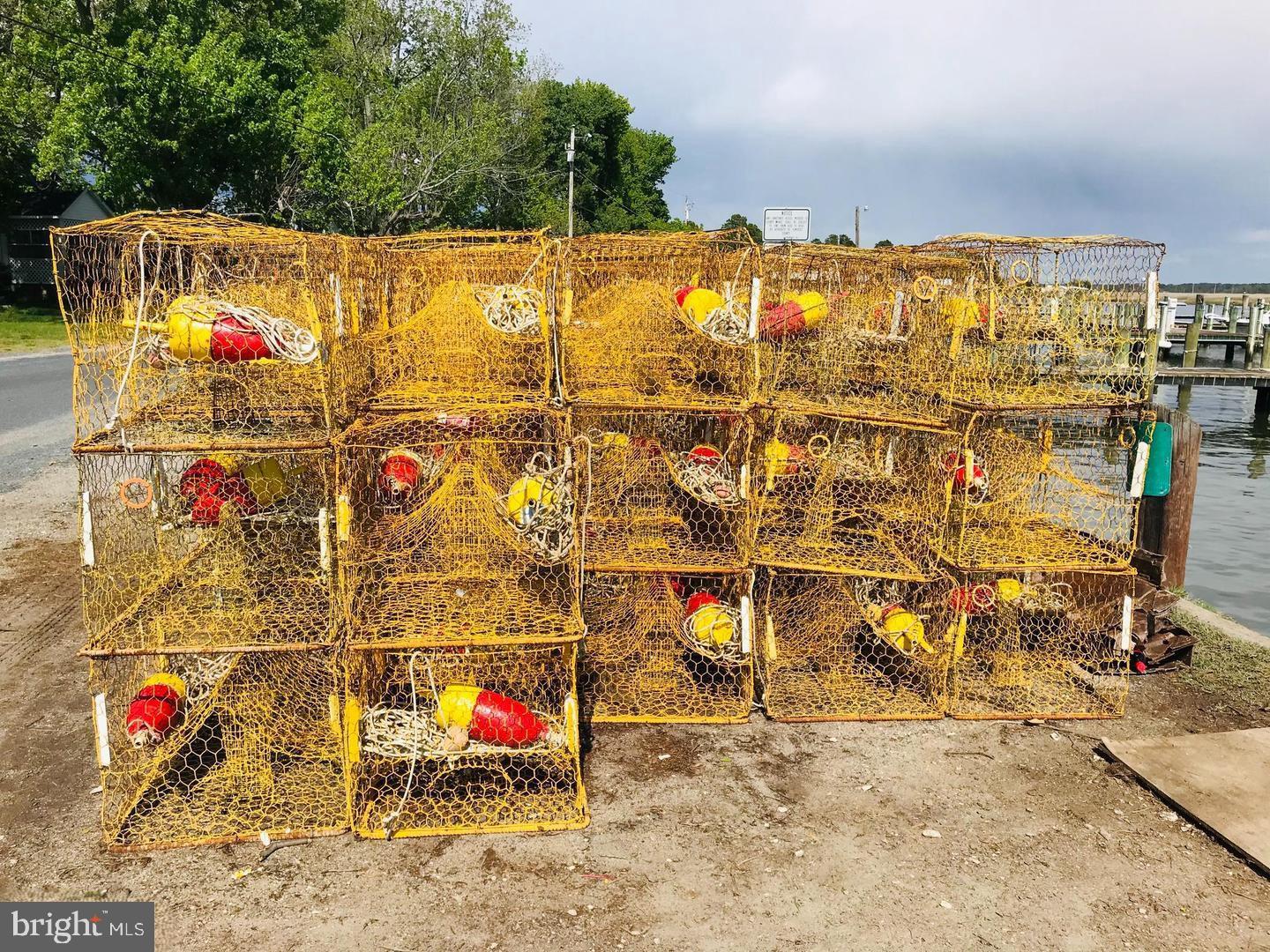 8034 Riverview Road Westover, MD 21871 - Photo 41 of 47 a view of roof deck with dining table and chairs