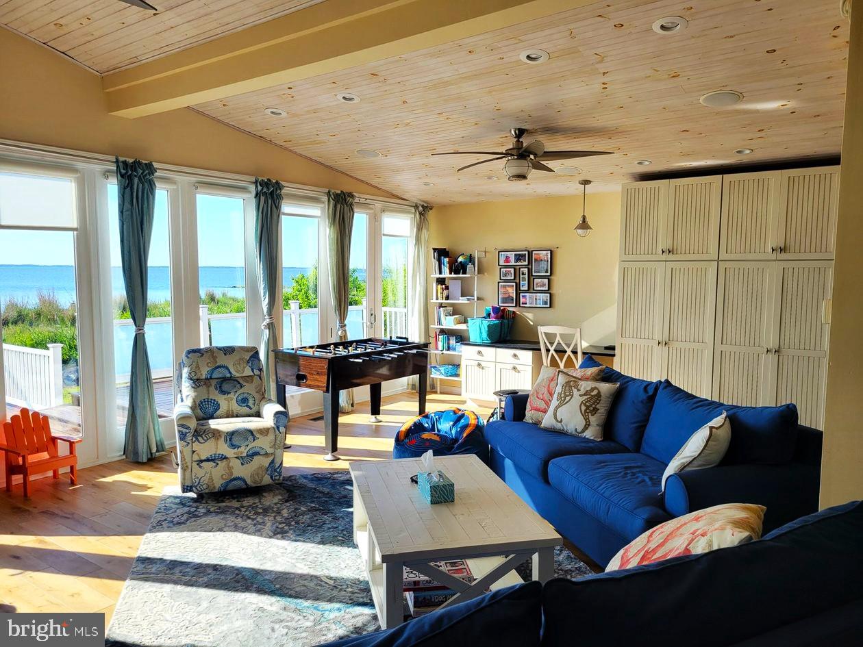 8034 Riverview Road Westover, MD 21871 - Photo 5 of 47 a living room with furniture and a large window