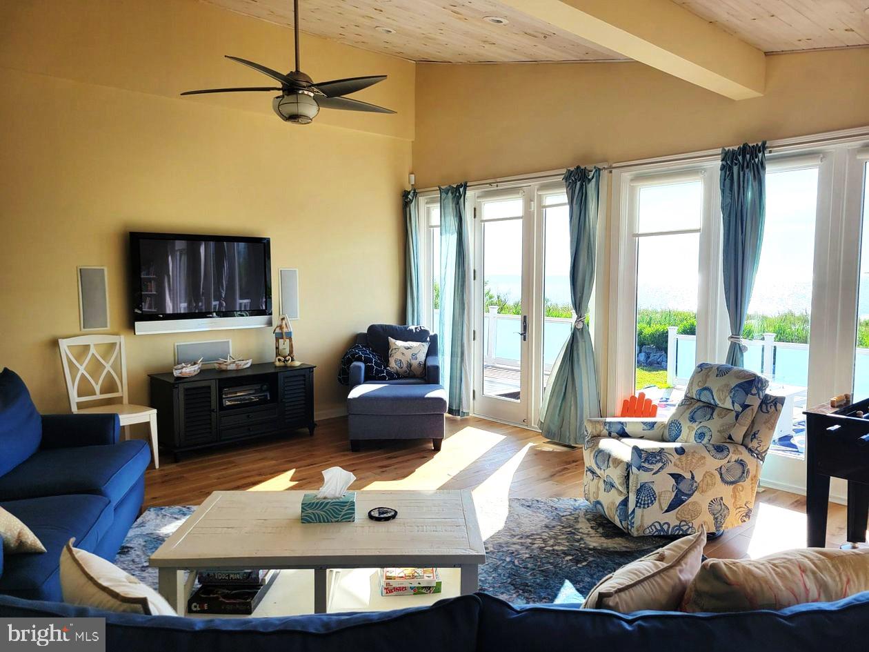 8034 Riverview Road Westover, MD 21871 - Photo 10 of 47 a living room with furniture and a large window