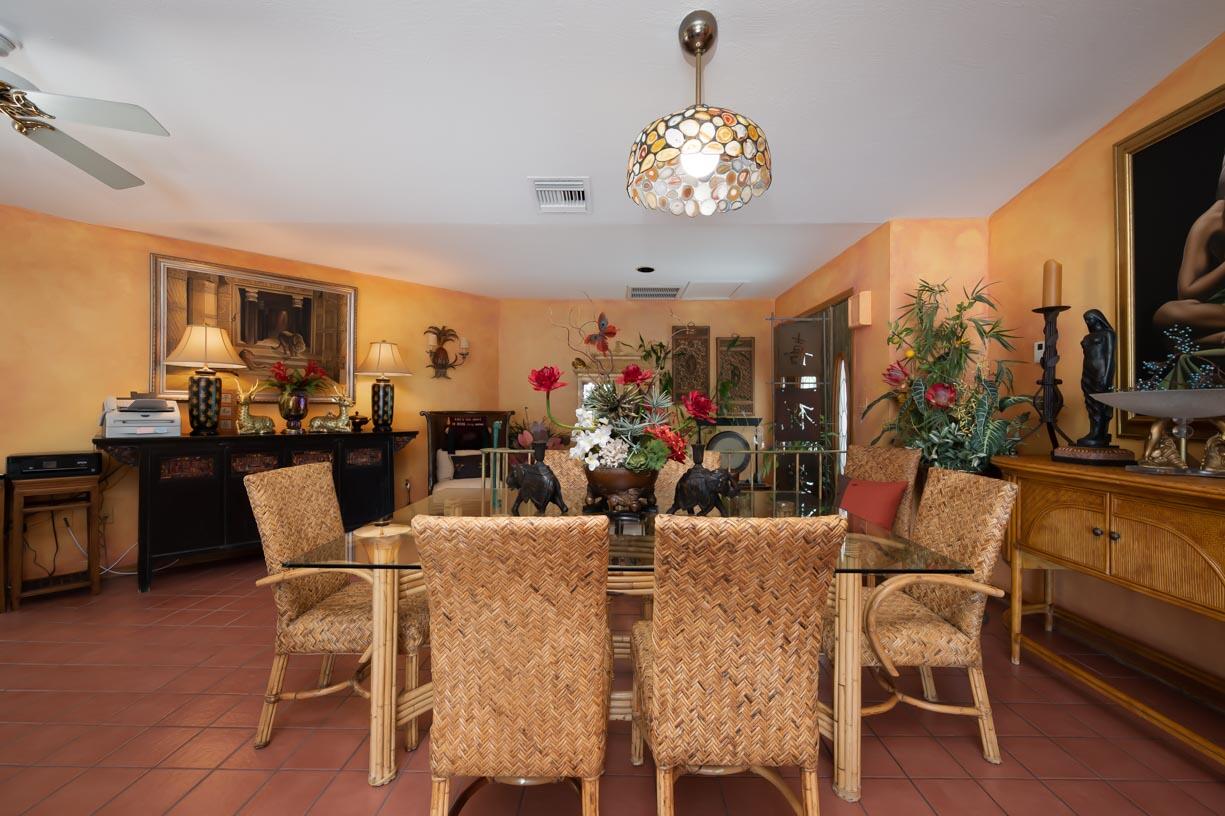 111 Windy Point Circle Marathon, FL 33050 - Photo 11 of 52 a view of a dining room with furniture and wooden floor