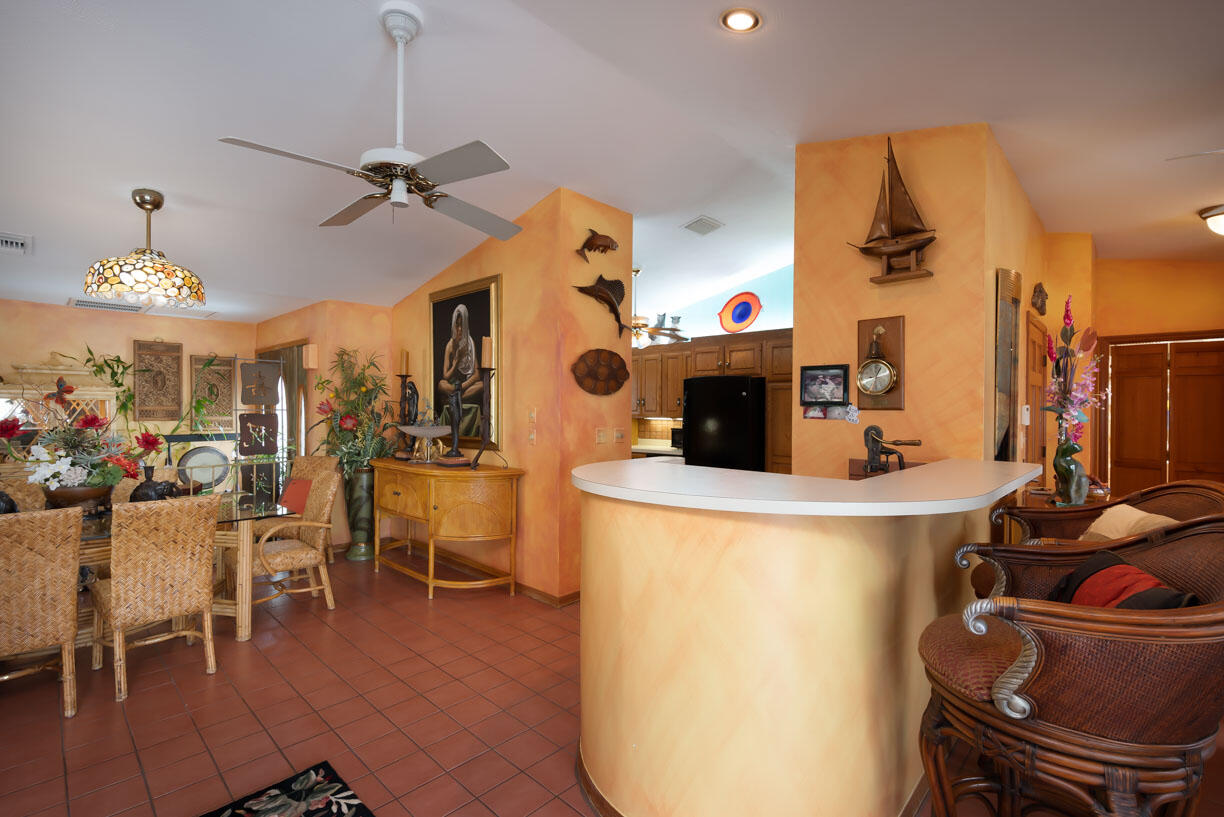 111 Windy Point Circle Marathon, FL 33050 - Photo 13 of 52 a view of a dining room with furniture and chandelier