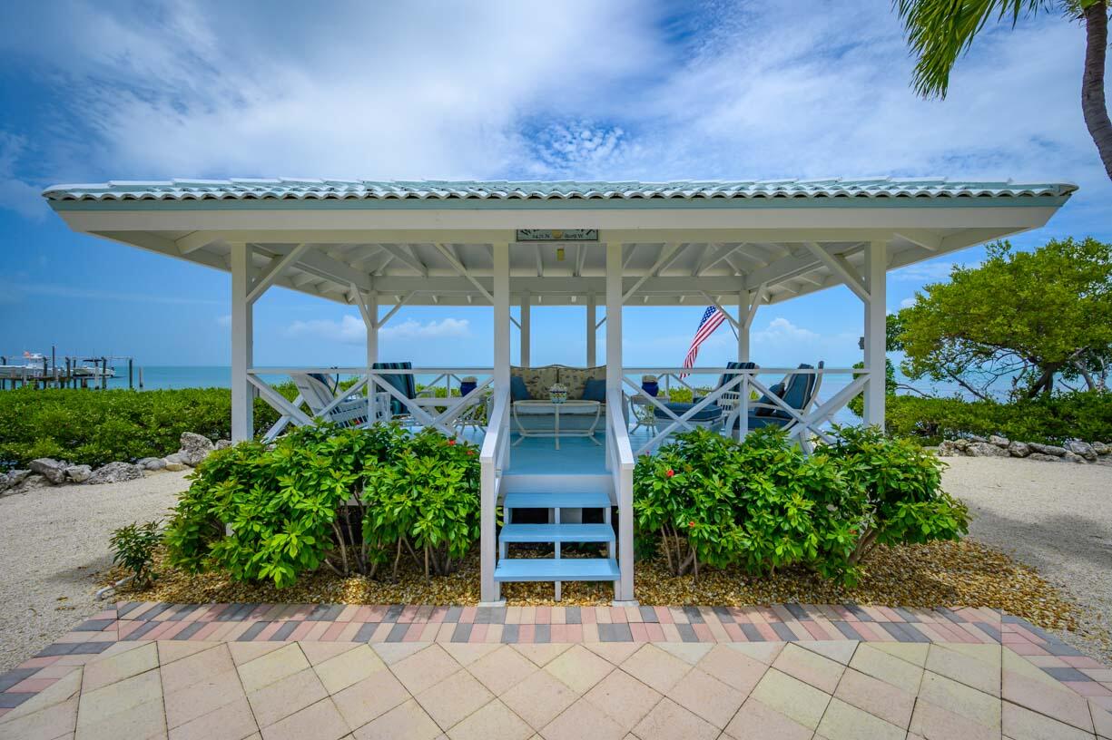 111 Windy Point Circle Marathon, FL 33050 - Photo 26 of 52 a front view of a house with plants