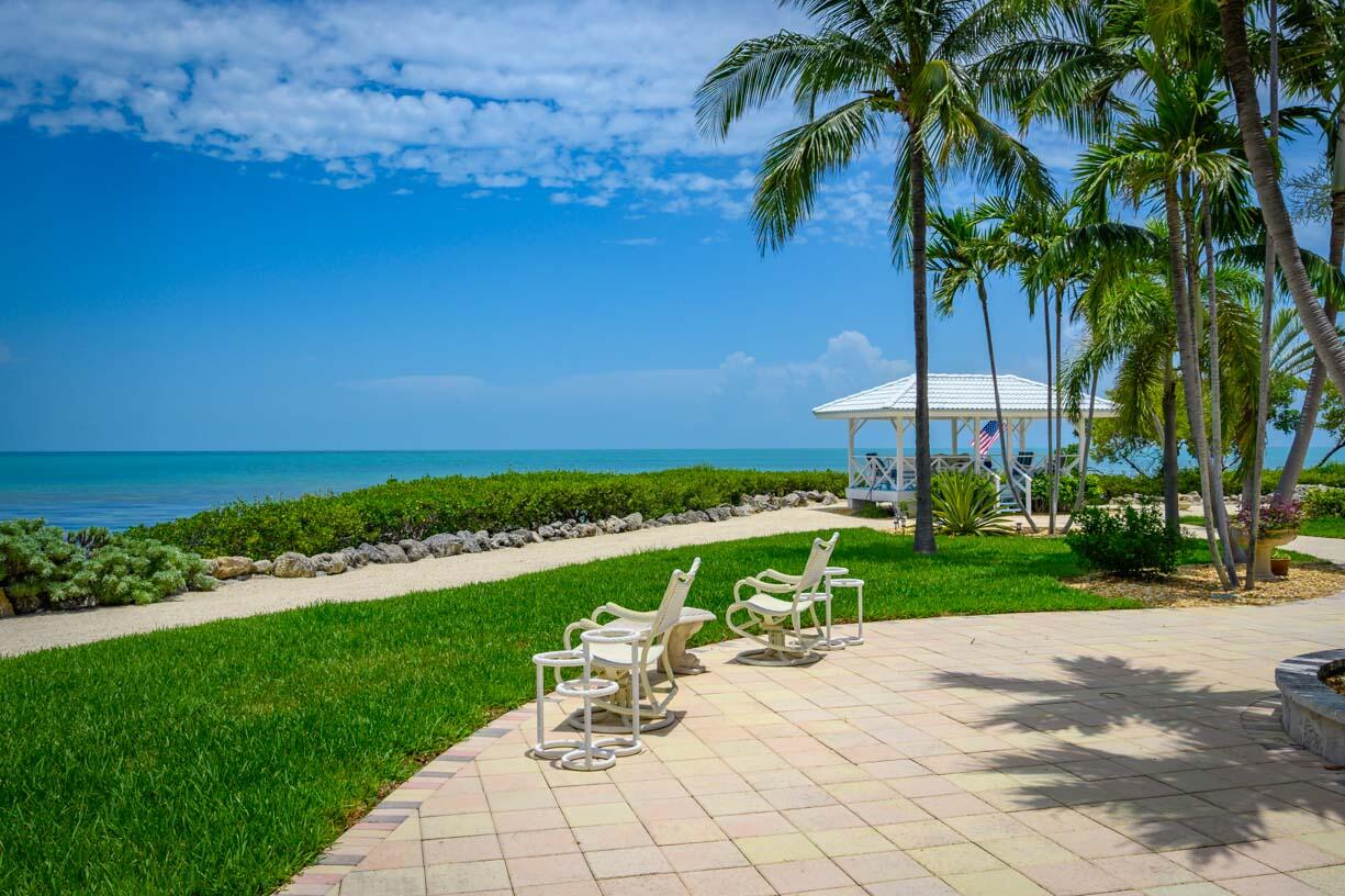 111 Windy Point Circle Marathon, FL 33050 - Photo 28 of 52 a view of a patio with a table and chairs