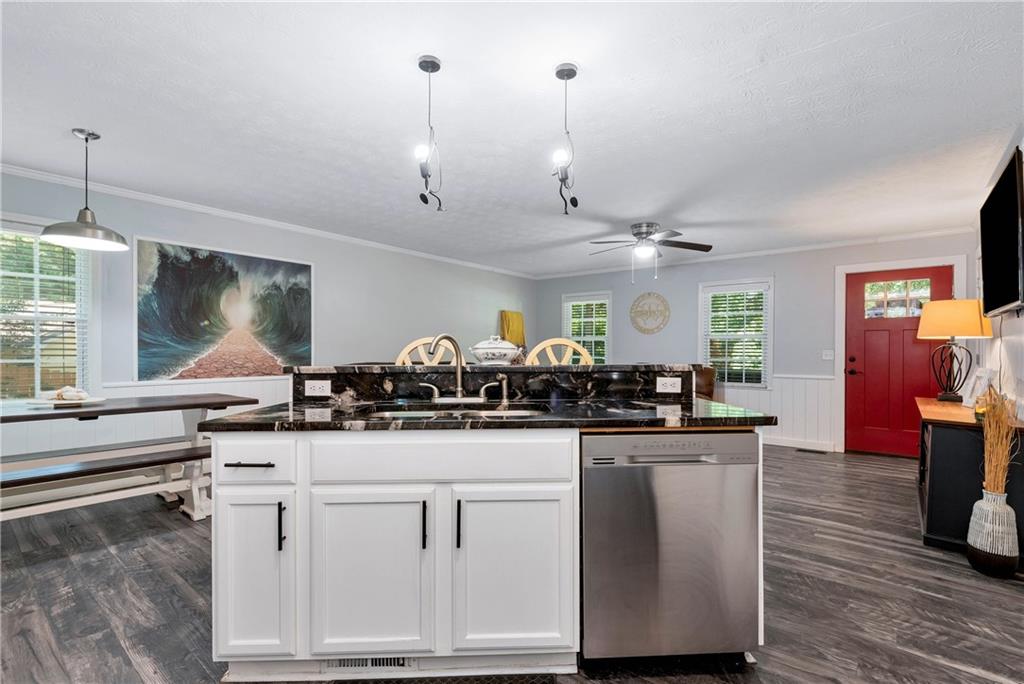 90 Old City Park Road Lavonia, GA 30553 - Photo 15 of 41 a kitchen with white cabinets and sink