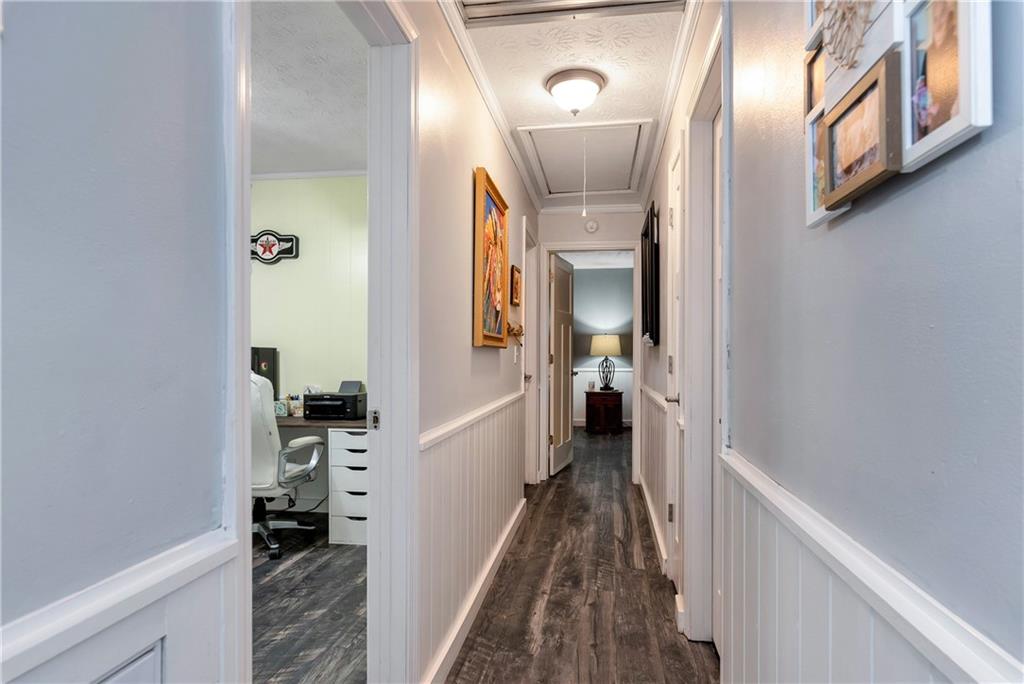 90 Old City Park Road Lavonia, GA 30553 - Photo 28 of 41 a view of a hallway with a hardwood floor