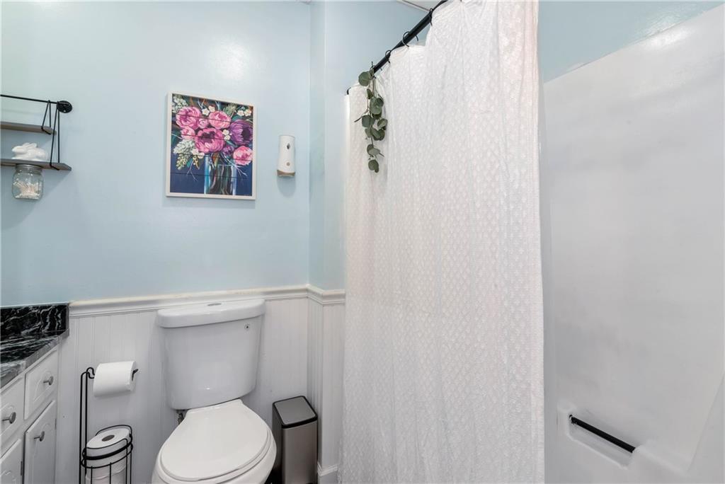 90 Old City Park Road Lavonia, GA 30553 - Photo 29 of 41 a white toilet sitting next to a white wall