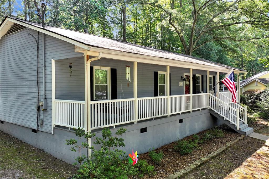 90 Old City Park Road Lavonia, GA 30553 - Photo 3 of 41 a view of a house with a yard