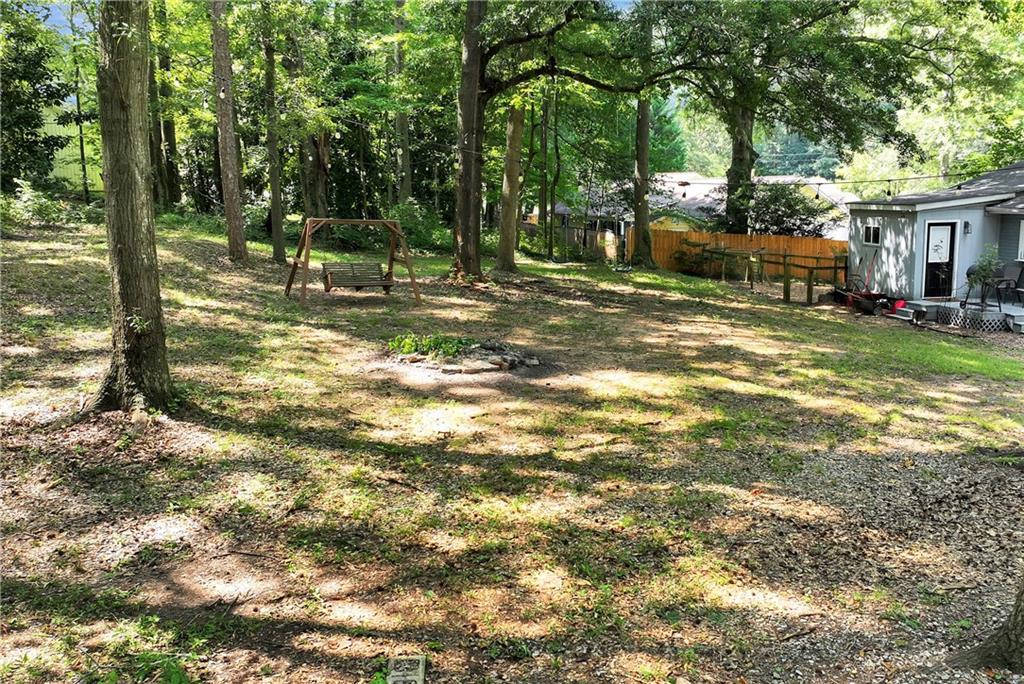 90 Old City Park Road Lavonia, GA 30553 - Photo 34 of 41 a view of a house with a yard