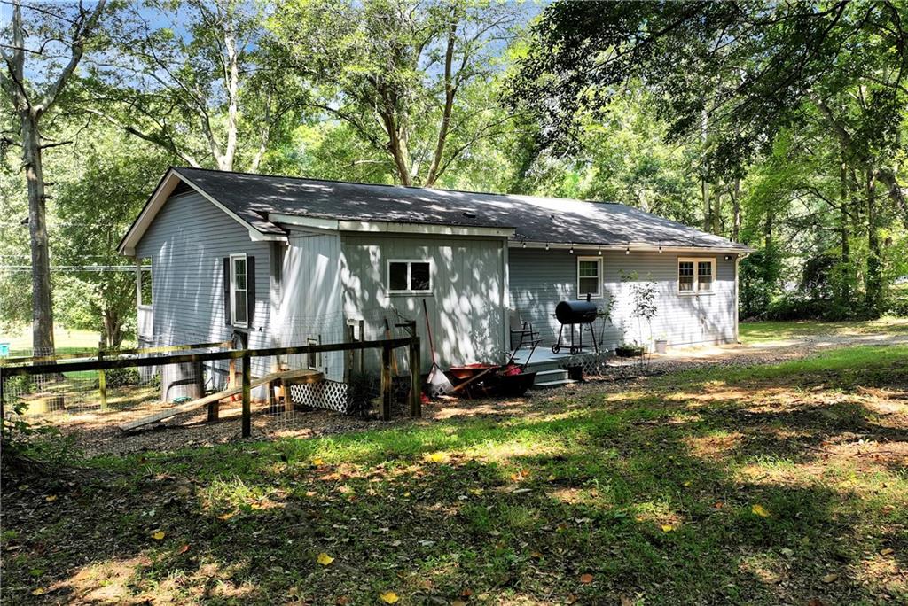 90 Old City Park Road Lavonia, GA 30553 - Photo 38 of 41 a view of a house with backyard space and balcony