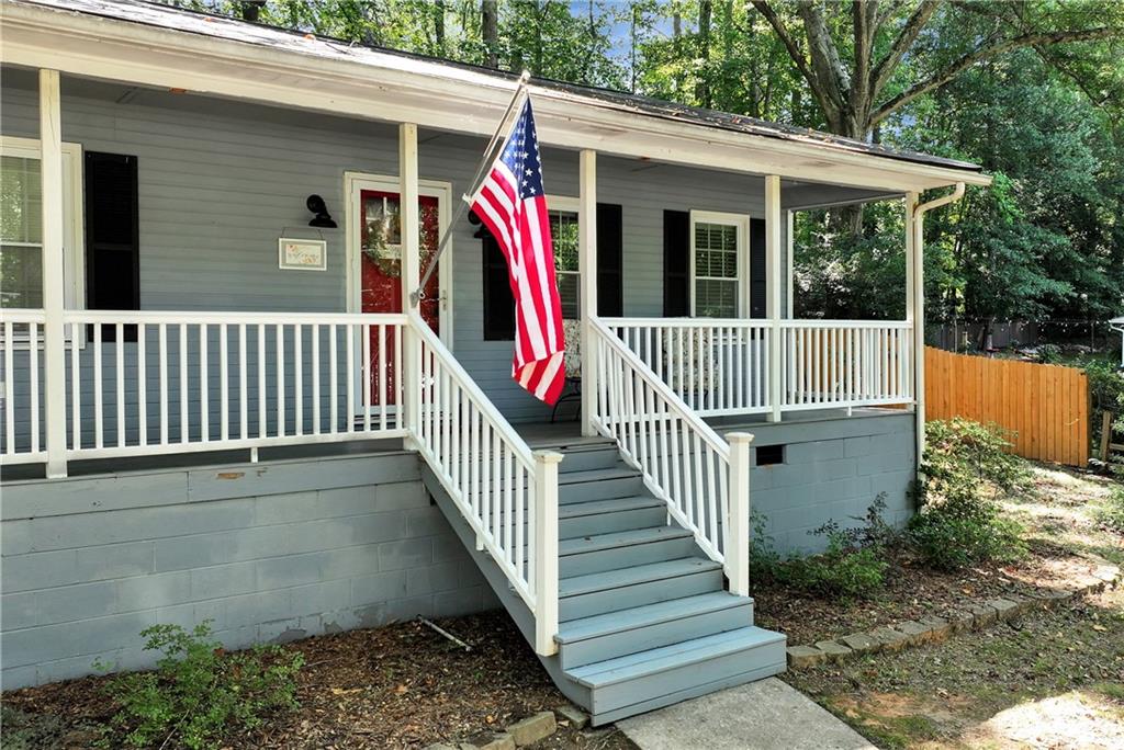 90 Old City Park Road Lavonia, GA 30553 - Photo 4 of 41 a view of a house with backyard and deck