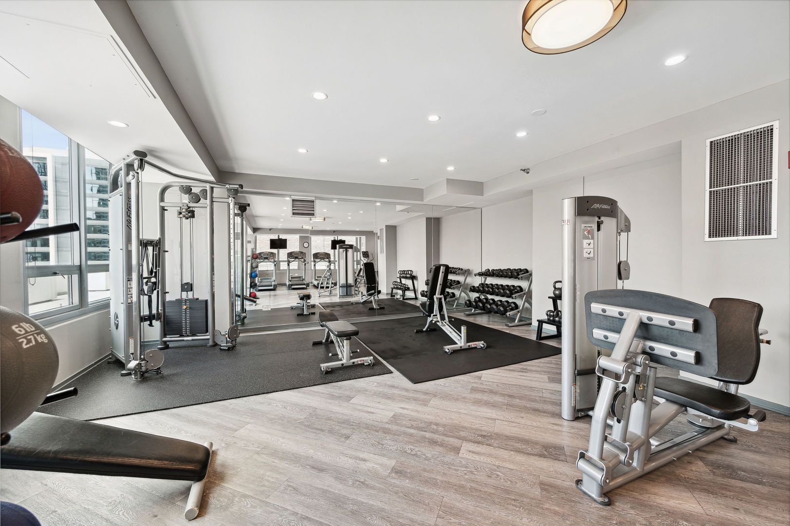 701 South Wells Street, Unit 903 Chicago, IL 60607 - Photo 19 of 20 a view of a room with gym equipment