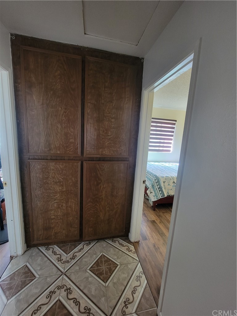 8381 Verde Ridge Road Spring Valley, CA 91977 - Photo 18 of 30 a bedroom with a bed and a window
