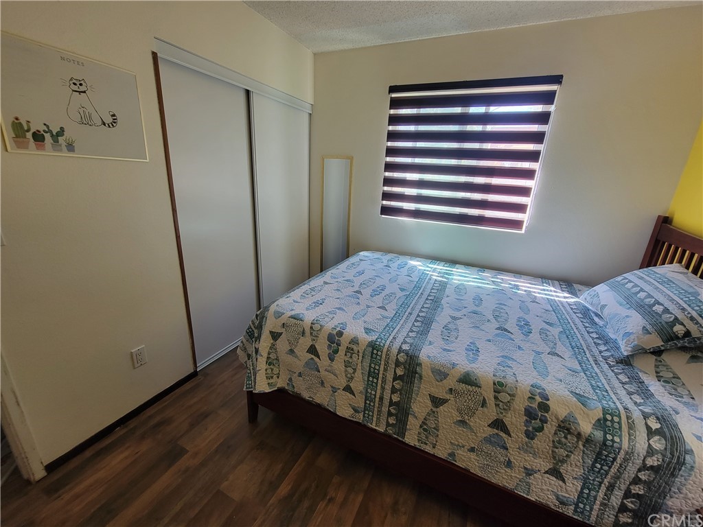 8381 Verde Ridge Road Spring Valley, CA 91977 - Photo 20 of 30 a bedroom with a bed and a window
