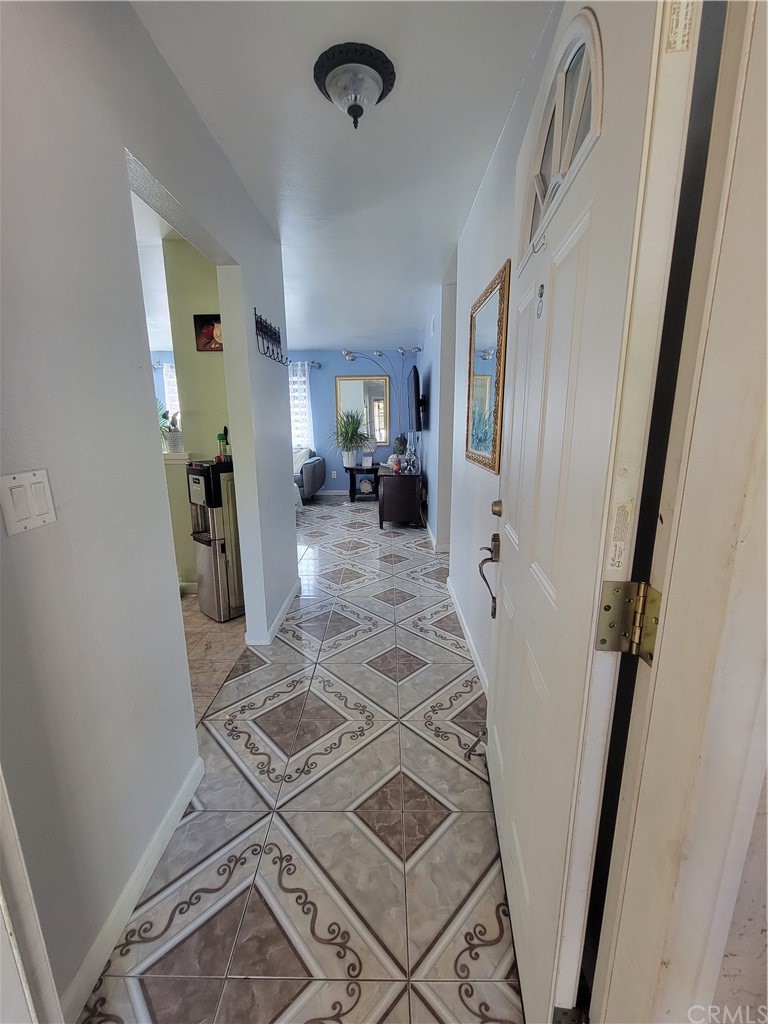 8381 Verde Ridge Road Spring Valley, CA 91977 - Photo 2 of 30 a living room with furniture and a rug