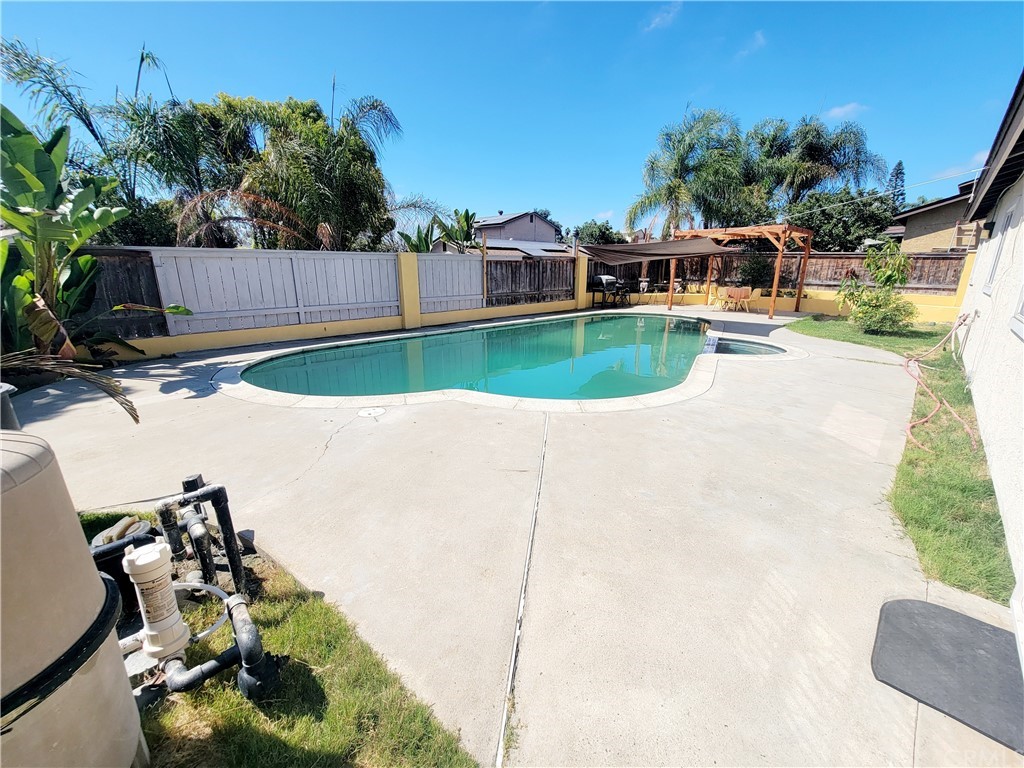 8381 Verde Ridge Road Spring Valley, CA 91977 - Photo 29 of 30 a view of a house with a swimming pool